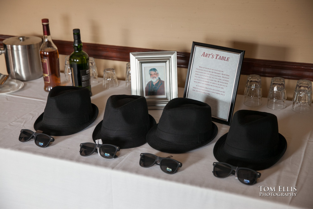 Groom and groomsmen's hats and sunglasses on table before a wedding at the Sorrento Hotel