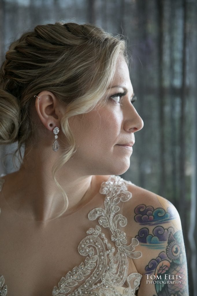 Close up profile photo of bride with soft window side lighting