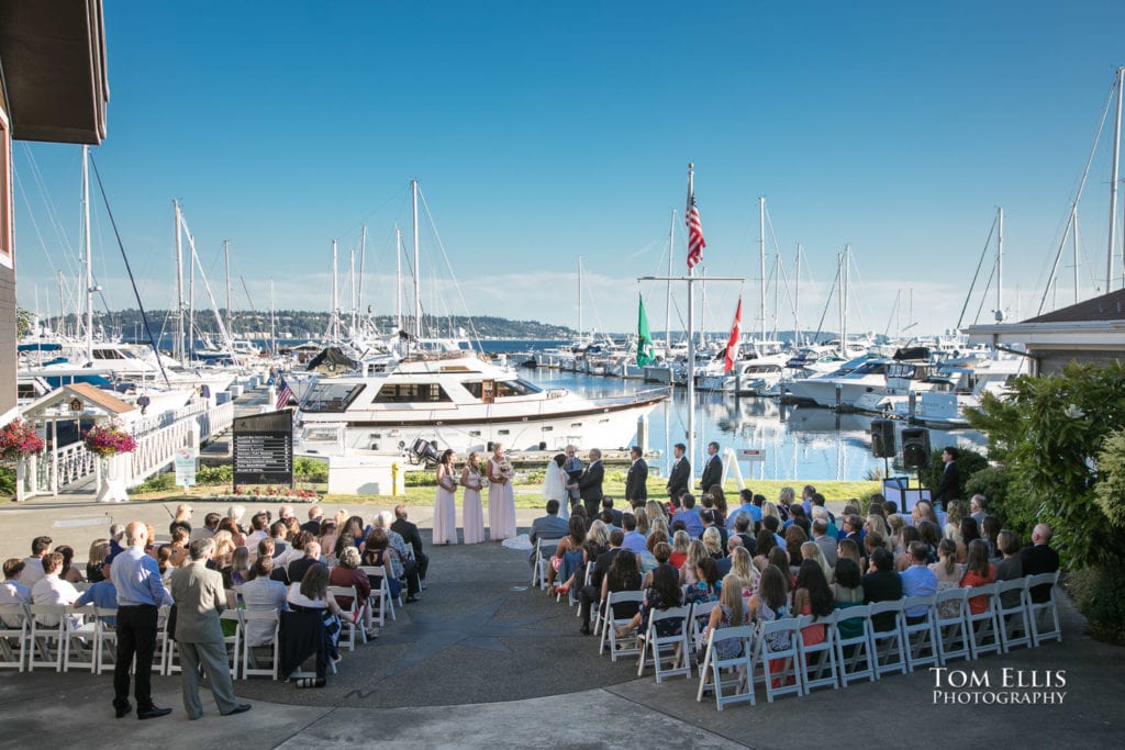Norma and Jeff's wedding ceremony on the patio outside the Alani Room at Palisade Restaurant, with Elliot Bay Marina in the background