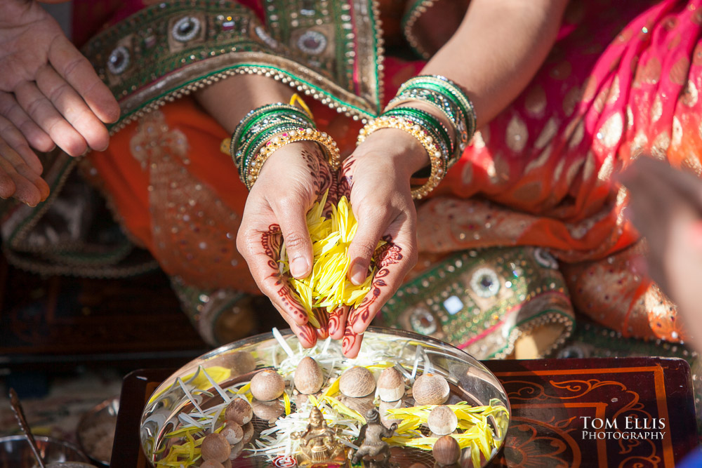 Close up photo of bride's hands during a traditional Indian wedding ceremony