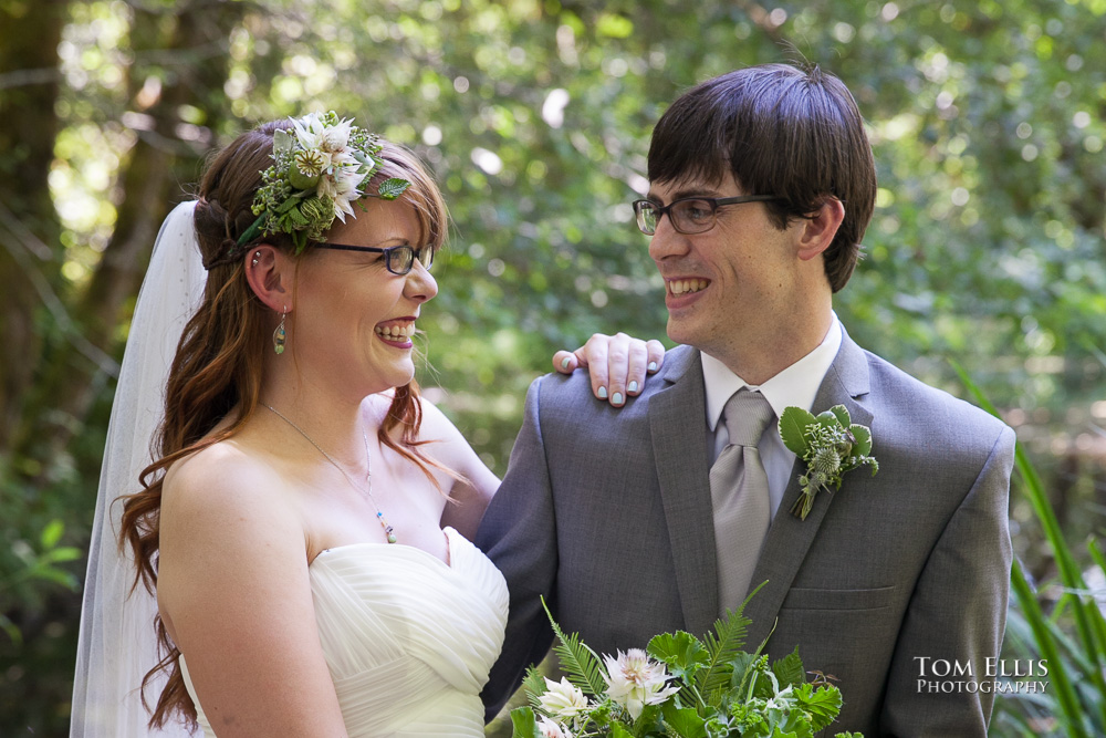 close up photo of bride and groom in the deep woods