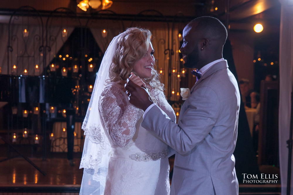 Couple shares their first dance at their Seattle wedding at the Lake Union Cafe