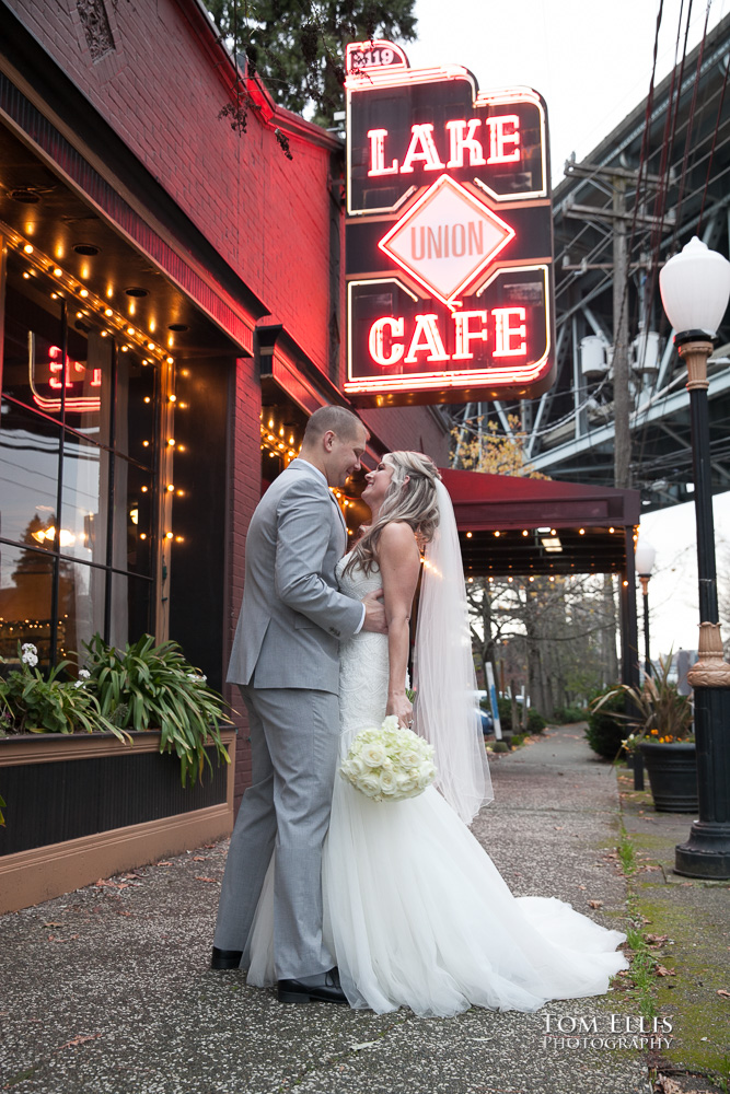 Bride and groom hug during their first-look before their Seattle wedding ceremony, outside the Lake Union Cafe