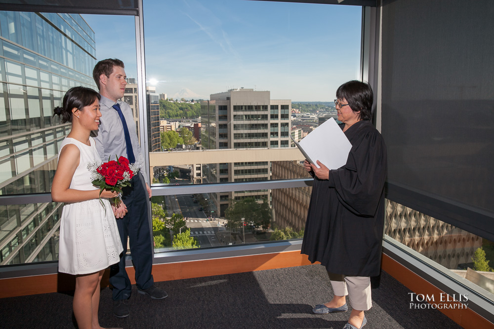 Couple being married by judge at the Seattle Municipal Courthouse