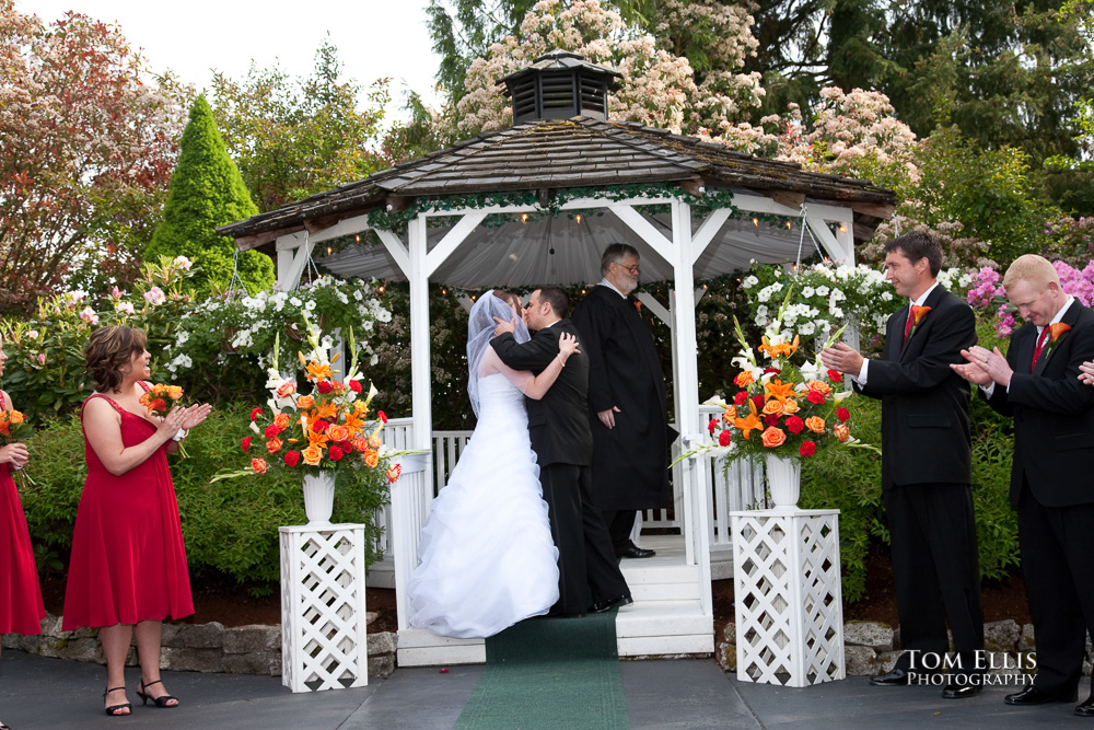 Bride and groom kiss at the end of their wedding ceremony at Leifer Manor