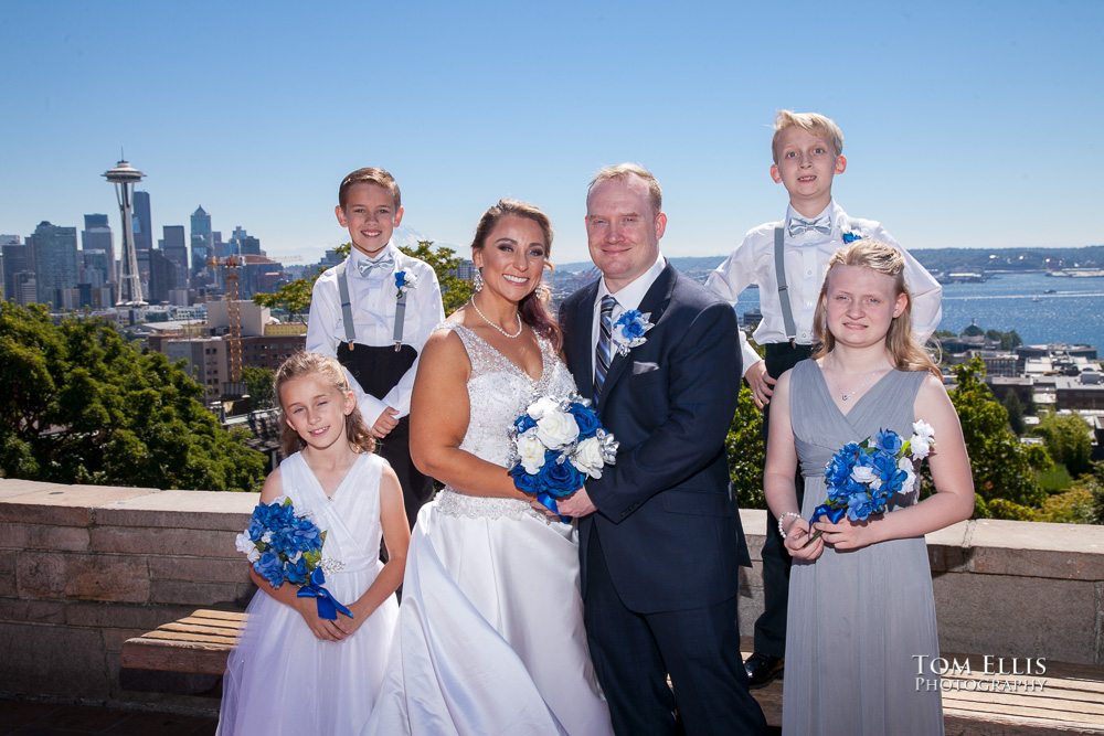 Kerry Park Wedding Photo - bride, groom and their four children pose with the Space Needle and Mt Rainier in the background