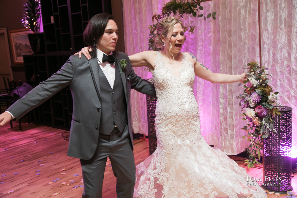 Bride and groom during their first dance as a new husband and wife, at the Tyee Yacht Club in Seattle, photographed by top rated Seattle wedding photographer Tom Ellis Photography