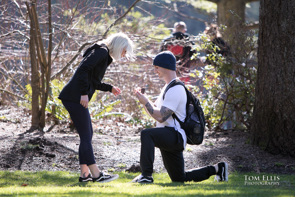 Andrew shows Julia her engagement ring during their surprise proposal at Snoqualmie Falls