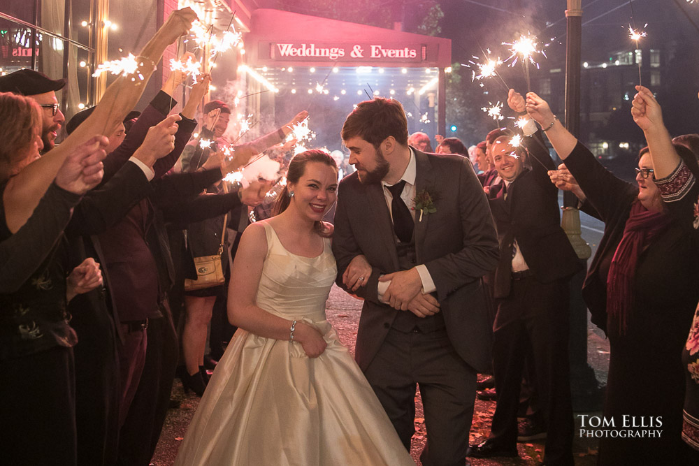 Amanda and Joe leaving their wedding reception at the Lake Union Cafe. Tom Ellis Photography, top-rated Seattle wedding photographer