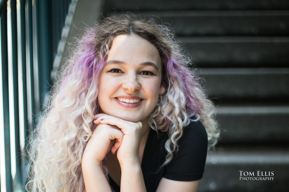 Beautiful high school girl with amazing purple and silver hair during her Seattle senior photography session at Pike Place Market, by Tom Ellis Photography