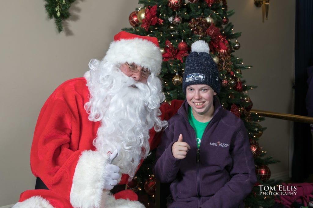 Santa poses with friends at the annual Special People's Holiday Cruise