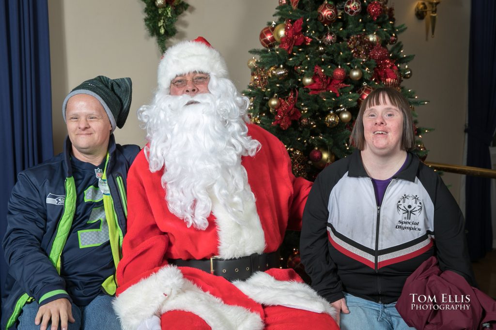 Santa with two friends at the 2018 Special People's Holiday Cruise