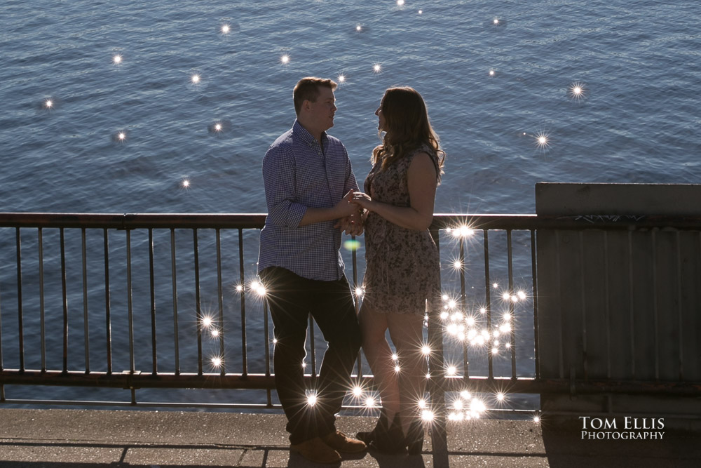 Kate and Kevin with amazing water sparkles during their engagement photo session at Gas Works Park