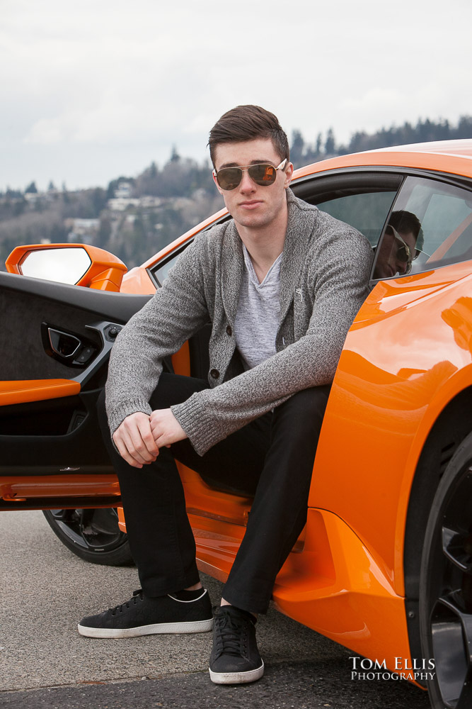 Luke looking very cool in his snglasses with his orange Lamborghini during his senior photo session at Newcastle Golf Club. Tom Ellis Photography, Seattle senior photographer