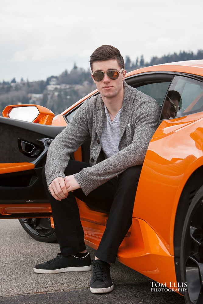 Luke looking very cool in his snglasses with his orange Lamborghini during his senior photo session at Newcastle Golf Club. Tom Ellis Photography, Seattle senior photographer