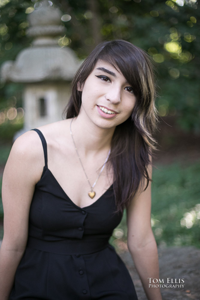 Beautiful high school senior girl in a Japanese garden during her senior photo session at Bellevue Botanical Gardens