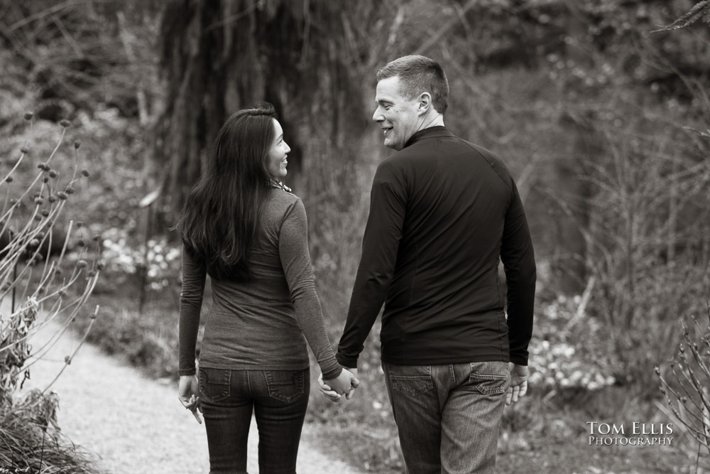 Elaina and Trip enjoy the park during our Seattle area engagement photo session at the Bellevue Botanical Garden