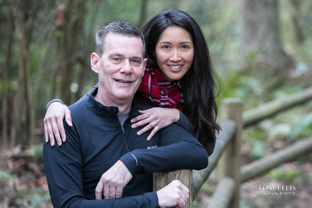 Elaina and Trip in the forest during our Seattle area engagement photo session at the Bellevue Botanical Garden