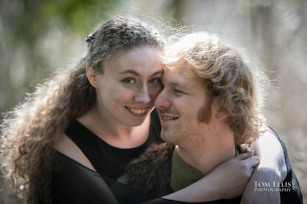 Romantic photo of engaged couple during their forest engagement photography session. Tom Ellis Photography, premier Seattle area wedding and engagement photographer