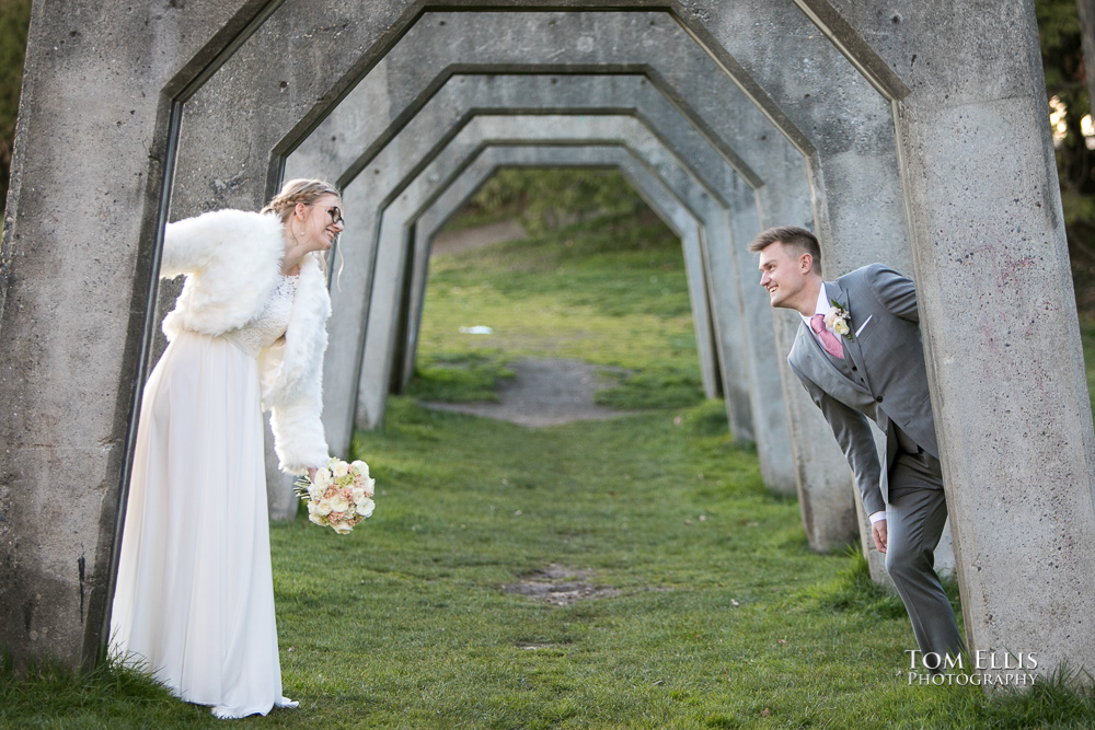 Mandy and James have some fun at Gas Works Park after their elopement wedding ceremony at the Seattle Municipal Courthouse. Tom Ellis Photography