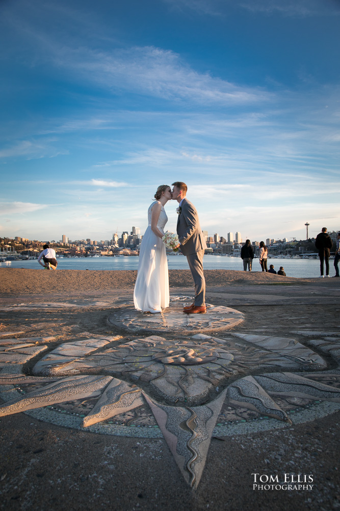 Mandy and James on the sundial at Gas Works Park after their elopement wedding at the Seattle municipal Courthouse. Tom Ellis Photography, Seattle wedding photographer