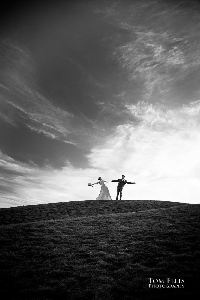 Mandy and James have some fun at Gas Works Park after their elopement wedding ceremony at the Seattle Municipal Courthouse. Tom Ellis Photography