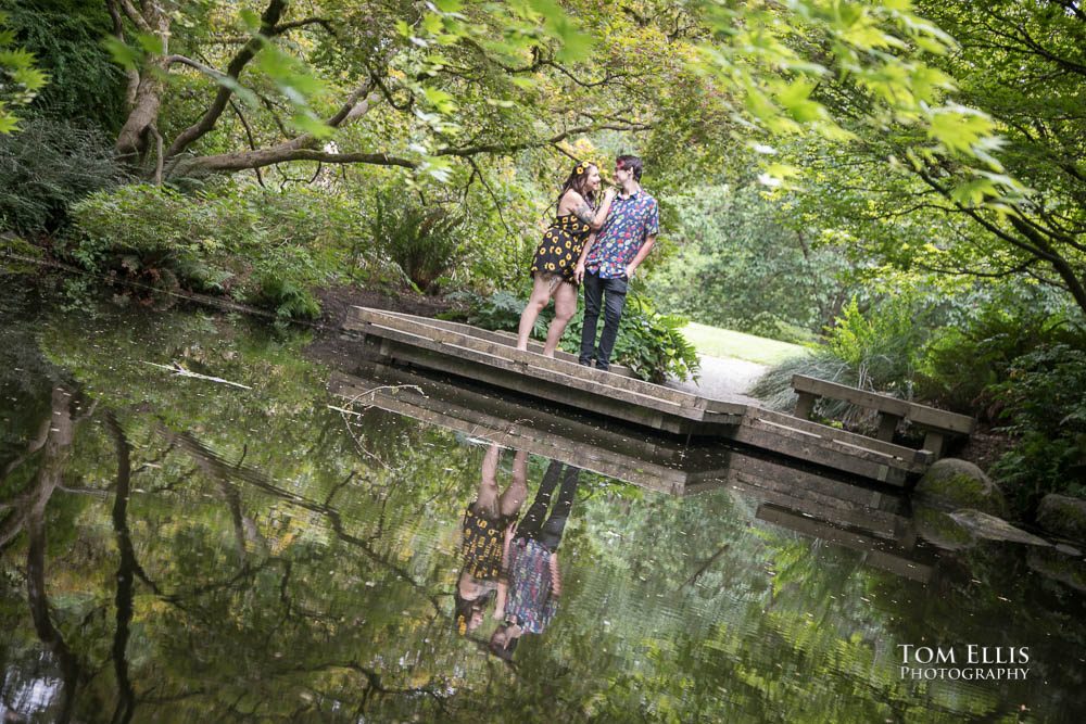 Aimee and Jordan at a pond in the woods during their Seattle engagement photo session at the Washington Arboretum
