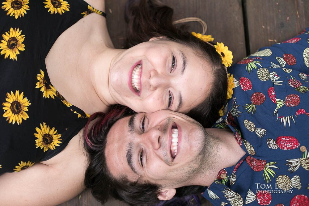 Close up of Aimee and Jordan lying head to head during their Seattle engagement photo session at the Washington Arboretum