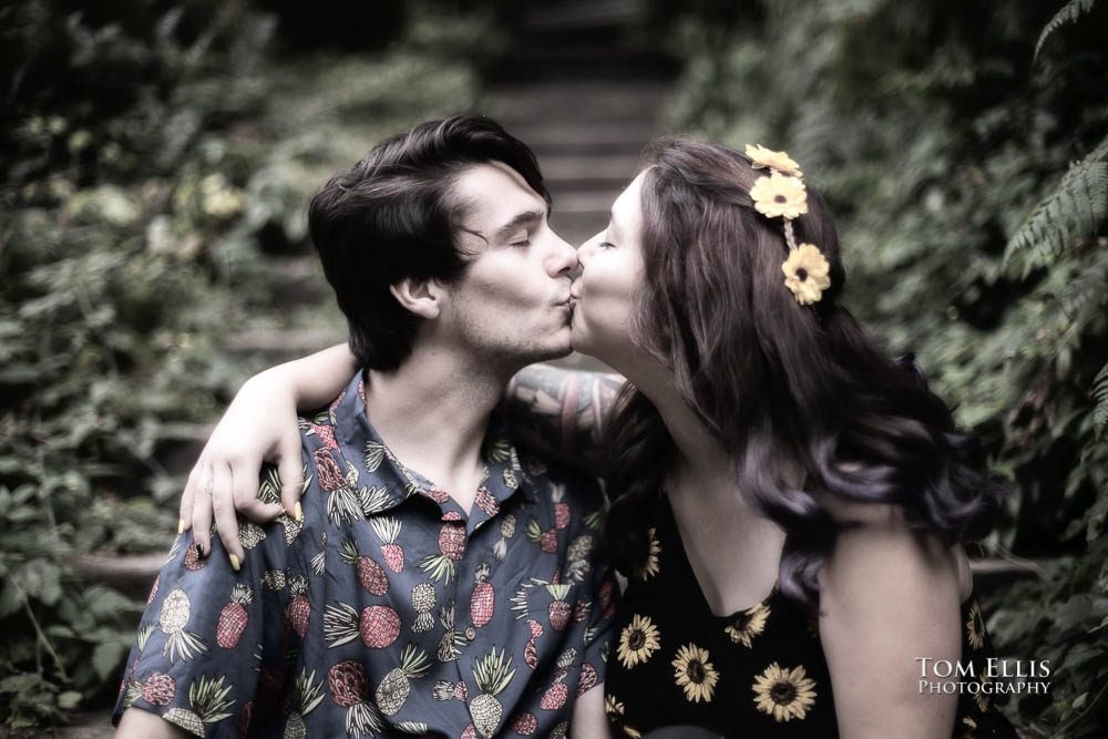 Close up of Aimee and Jordan kissing in the woods during their Seattle engagement photo session at the Washington Arboretum