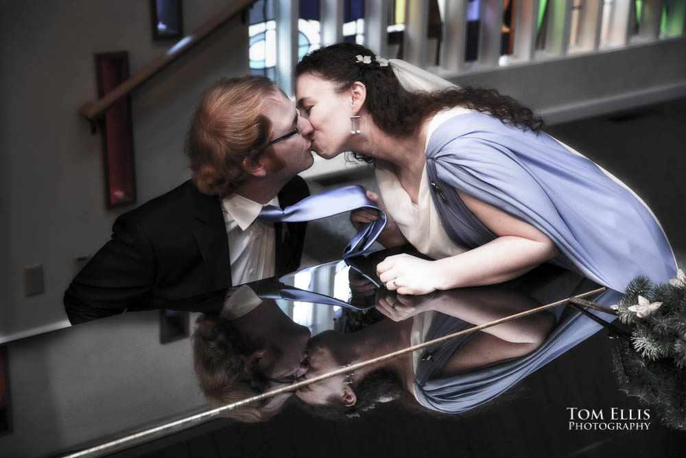 Reflection of bride and groom on piano.  Fantastic fantasy and science fiction HTTYD wedding - Tom Ellis Photography, Seattle wedding photographer