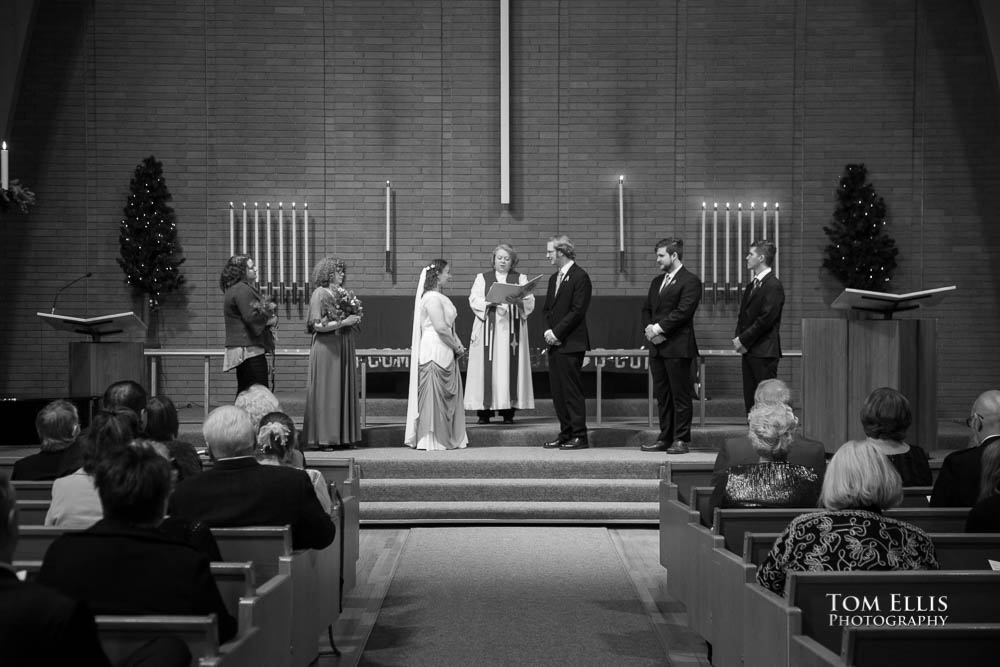 Dorothy Ann and Matthew at the altar during their wedding ceremony. Tom Ellis Photography, Seattle wedding photographer