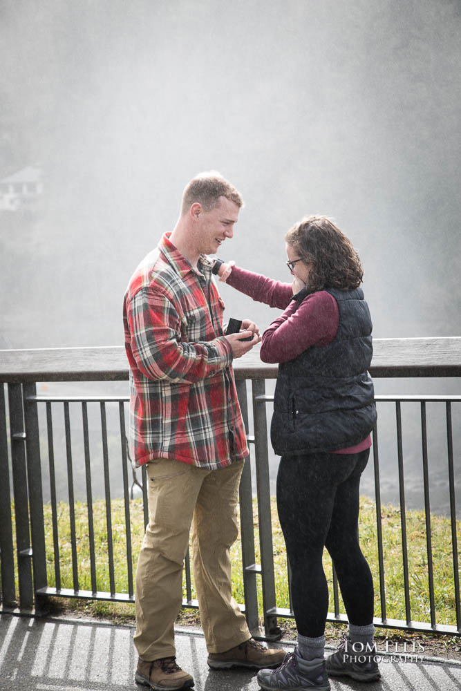 Snoqualmie Falls surprise proposal and engagement session - Ben shows Samantha the ring