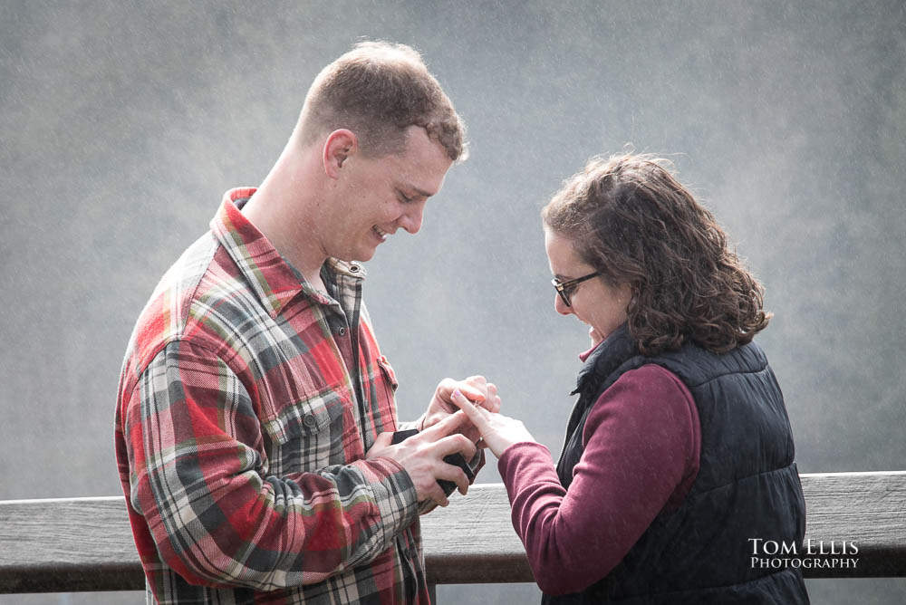 Snoqualmie Falls surprise proposal and engagement session - Ben puts the ring on Sammy's finger