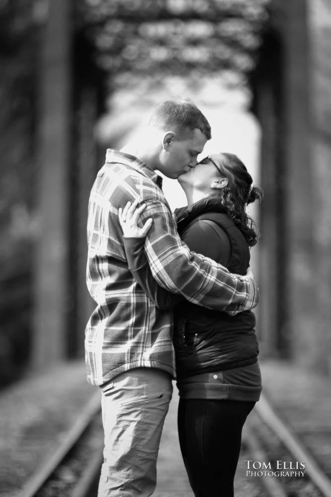 Snoqualmie Falls surprise proposal and engagement session - Ben and Sammy kiss