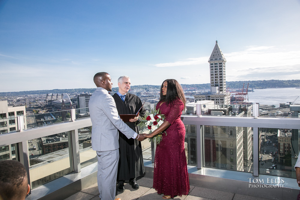 Christine and Clements elopement wedding ceremony on the rooftop of the Seattle Municipal Courthouse. Tom Ellis Photography