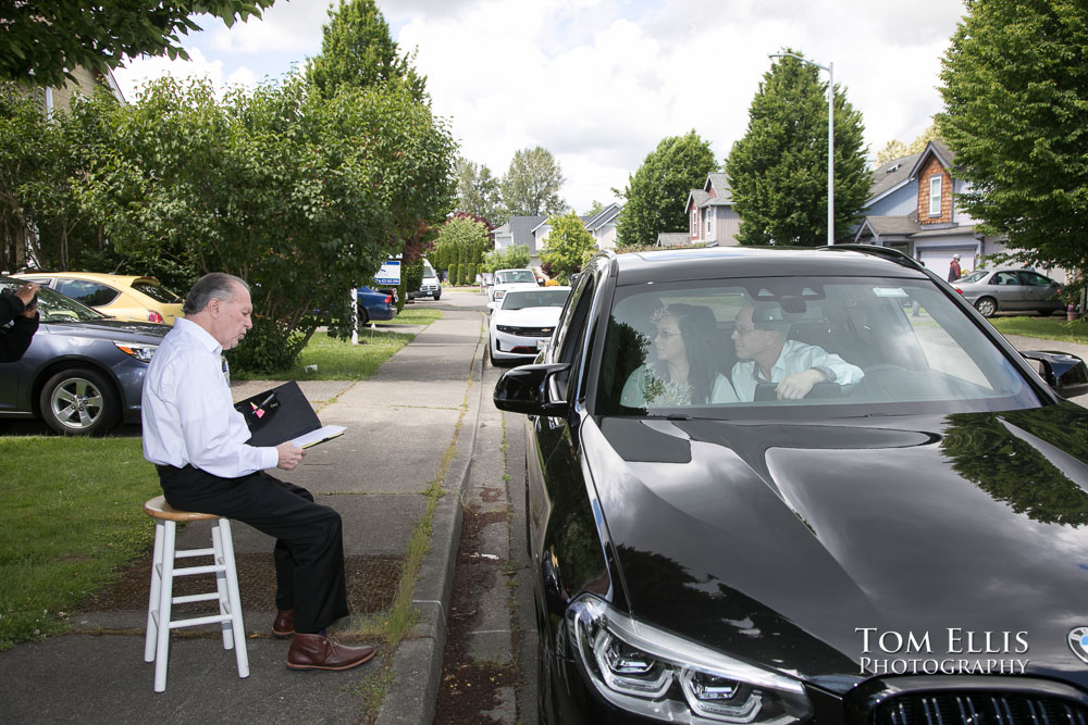 Liliana and Greg's quarantine elopement ceremony in their car. Tom Ellis Photography, Seattle elopement photographer.