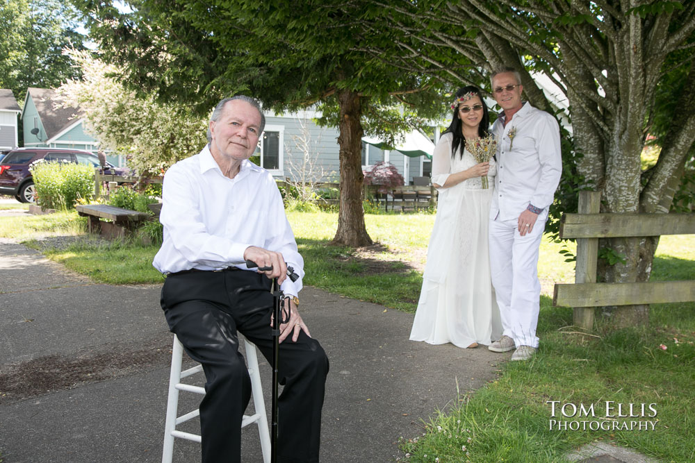 Liliana and Greg's quarantine elopement ceremony in their car. Tom Ellis Photography, Seattle elopement photographer.