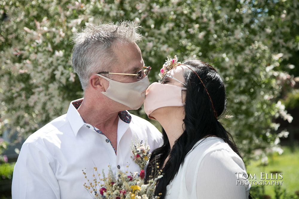 Liliana and Greg's quarantine elopement ceremony in their car. Tom Ellis Photography, Seattle elopement photographer.