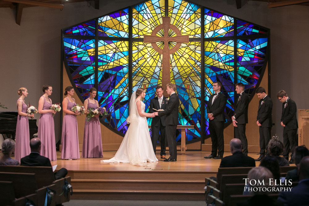 Mathew and Allison exchange their vows during their Seattle area wedding at John Knox Presbyterian Church
