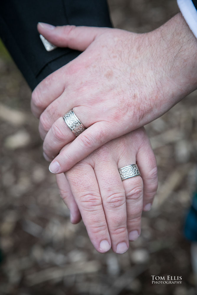 The two grooms' hands and wedding rings. Sensational Seattle same-sex LGBTQ wedding. Tom Ellis Photography, Seattle Wedding Photographer
