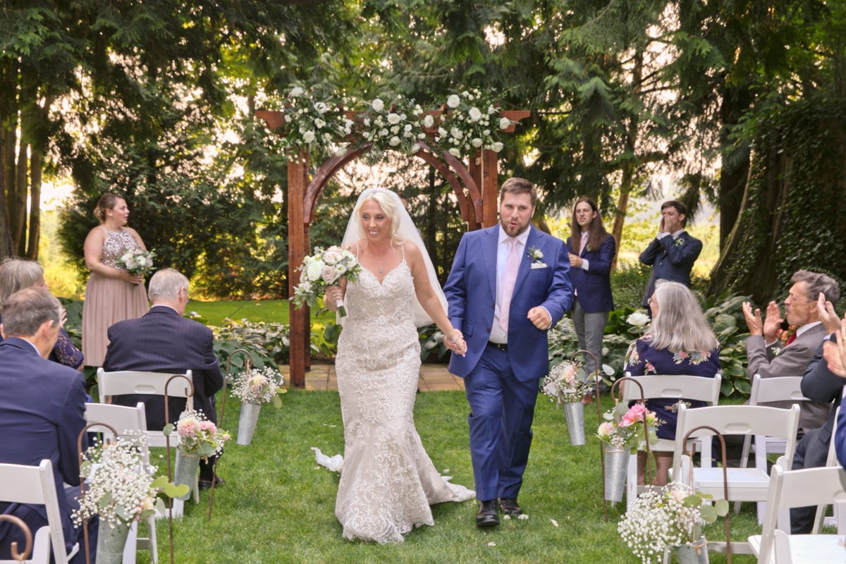 Kelly and David walk down the aisle at the conclusion of their destination wedding. Tom Ellis Photography, destination wedding photographer