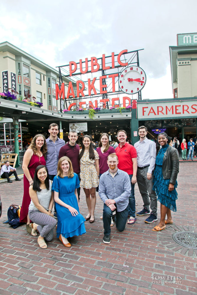 Sarah and Jacob in Pike Place Market during out pre-wedding photo session. Tom Ellis Photography, Seattle engagement photographer