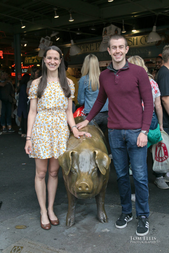 Sarah and Jacob in Pike Place Market during out pre-wedding photo session. Tom Ellis Photography, Seattle engagement photographer