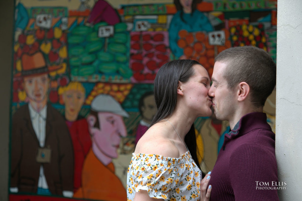 Sarah and Jacob in Pike Place Market during out pre-wedding photo session. Tom Ellis Photography, Seattle engagement photographer