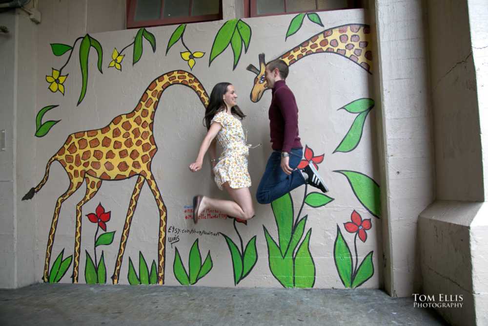 Sarah and Jacob in Pike Place Market during out pre-wedding photo session. Tom Ellis Photography, Seattle engagement photographer