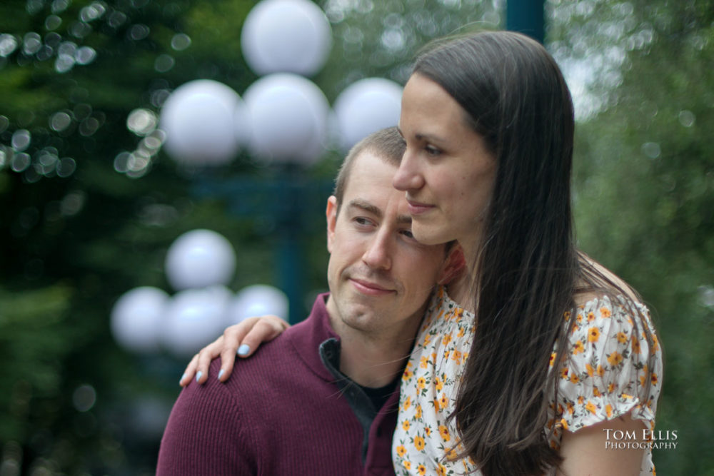 Sarah and Jacob in Pike Place Market during out pre-wedding photo session. Tom Ellis Photography, Seattle engagement photographer