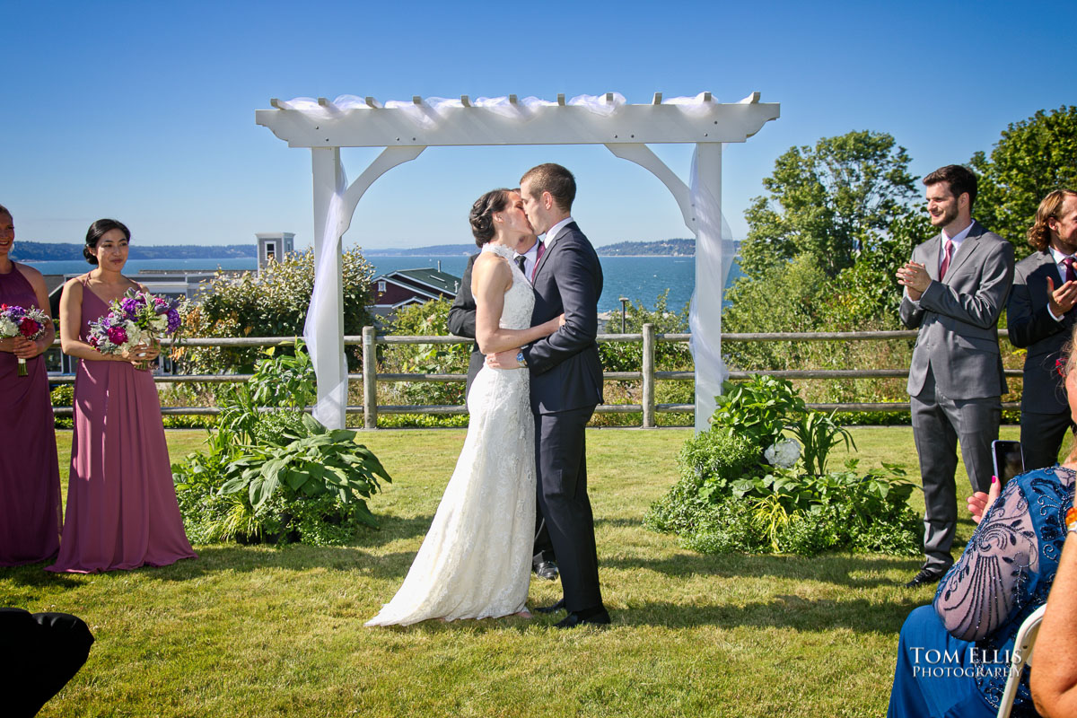 Sarah and Jacob kiss at the end of their wedding ceremony at Rose Hill Community Center. Tom Ellis Photography, Seattle wedding photographer