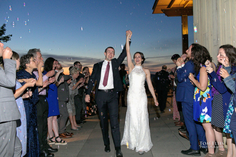 Sarah and Jacob say goodbye the end of their wedding reception at Rose Hill Community Center. Tom Ellis Photography, Seattle wedding photographer