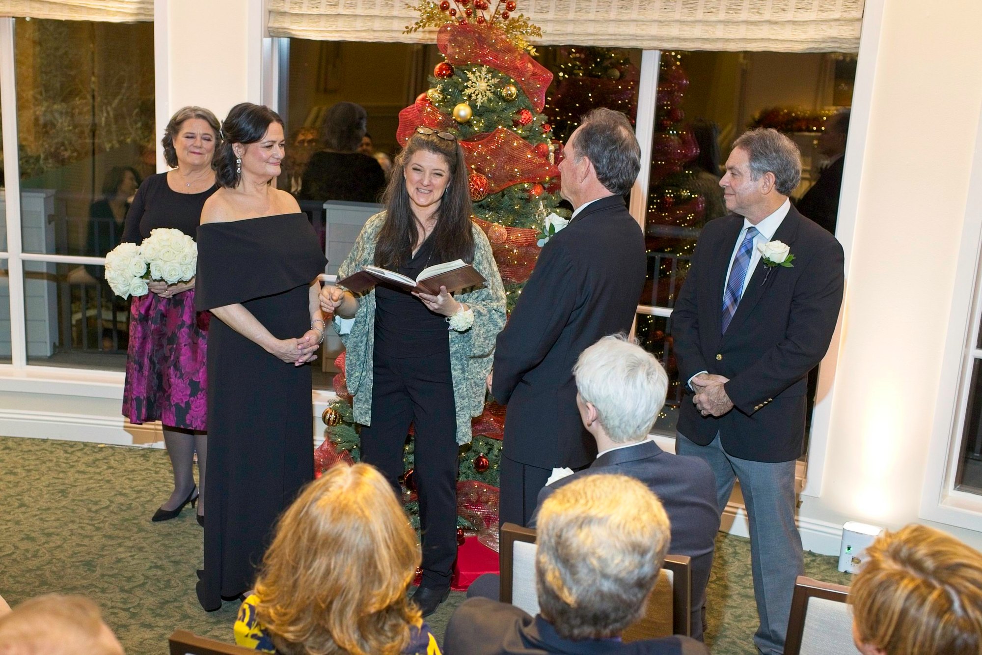 Susan and Tom's Holiday season wedding ceremony at the Seattle Tennis Club. Tom Ellis Photography, Seattle wedding photographer