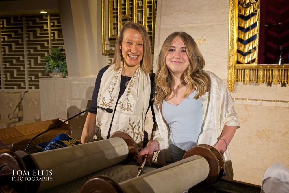 Lucinda and her rabbi pose with the Torah just before Lucinda's Bat Mitzvah ceremony at Temple de Hirsch Sinai in Seattle